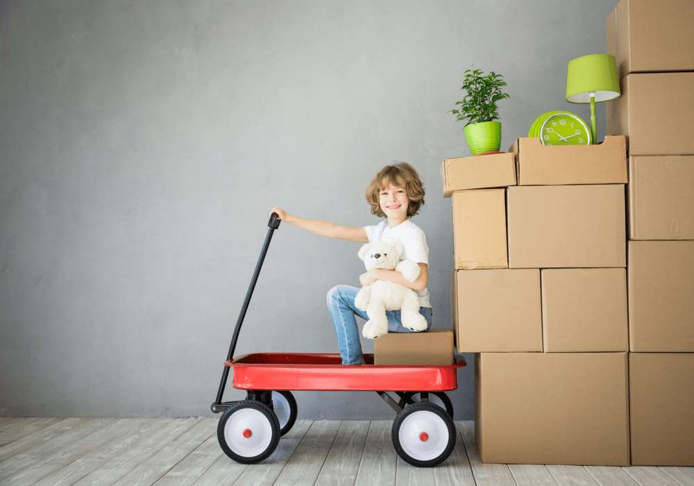 Family home being moved with a large moving truck and crew - moving companies chicago cheap