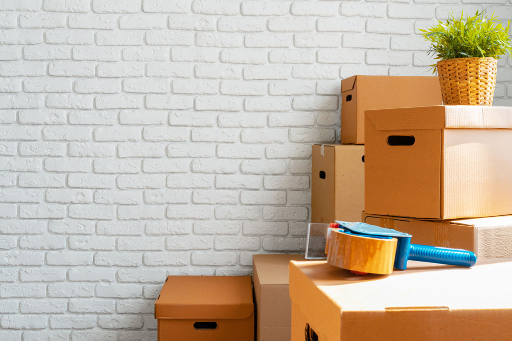 Organized packing materials and boxes prepared for packing in an Illinois home